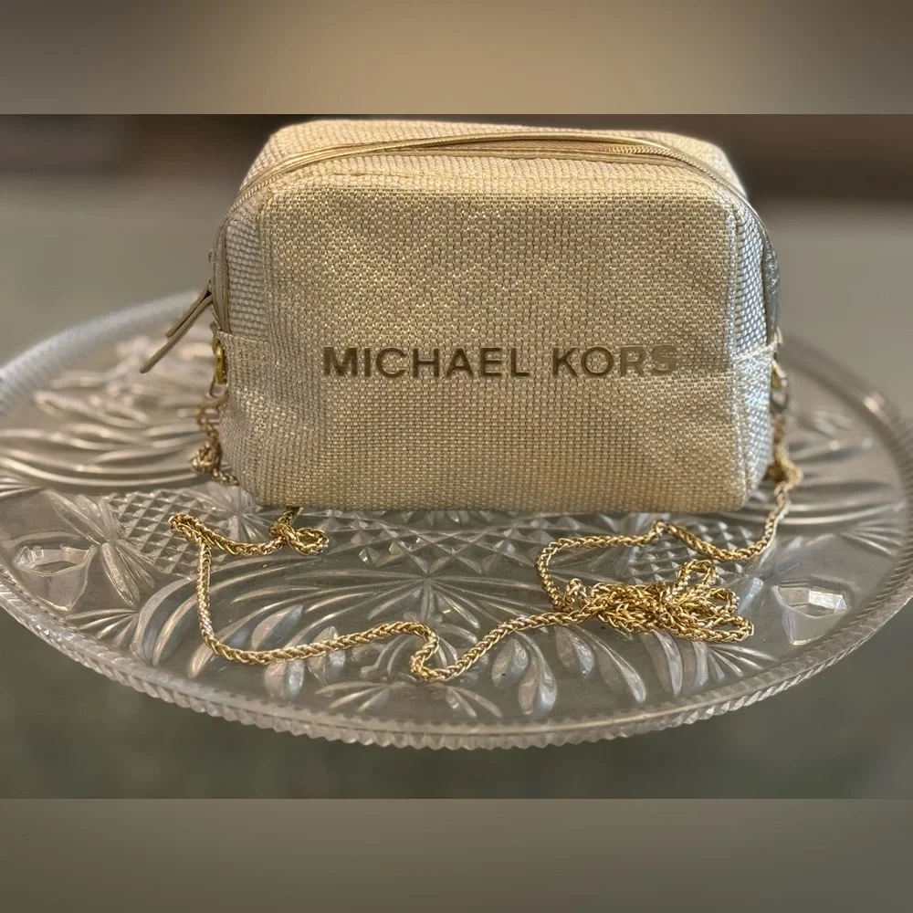 Michael Kors Shimmering Cream Gold Pouch with golden sling